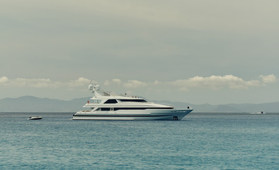 Fototapeta na wymiar Motor Yacht at Cala Saona in Formentera. Spain