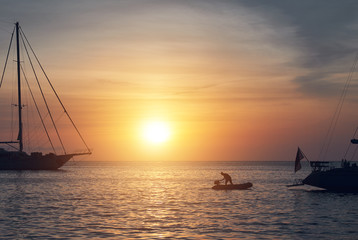 Fototapeta premium Vessels at Cala Saona in Formentera at sunset. Spain
