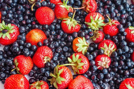 Berries variety - berries background: strawberries, blueberries