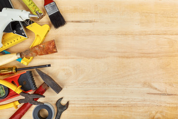 Hand tools on wooden background with copy space, Top view