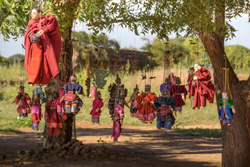 Fototapeta na wymiar myanmar bagan burma travel Pagan Kingdom marionette rope hinging monk myanmar