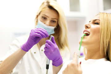 Young Woman At The Dentist