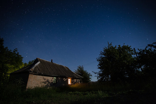 Country building under night sky