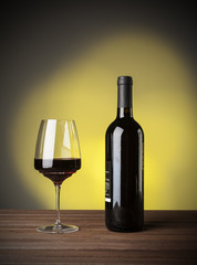 Red wine in bottle and glass