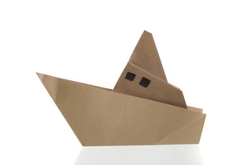 Origami boat papercraft by recycle paper isolated in white background