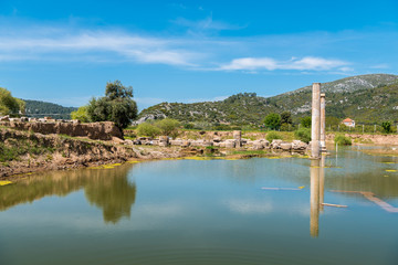 Fototapeta na wymiar April 11, 2017 - Claros, Izmir province, Turkey. Claros, an ancient Greek sanctuary on the coast of Ionia, famous for a temple and oracle of Apollo