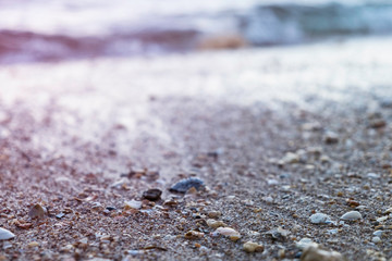 Water rolling in over a rocky beach in Lagos, Portugal