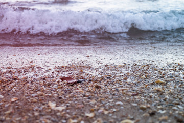 Waves rolling in over a rocky beach in Lagos, Portugal