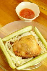 fried chicken thigh dressing salt and pepper dipping with chili sauce 