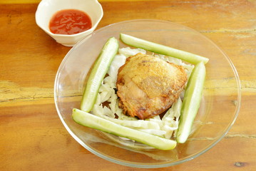 fried chicken thigh dressing salt and pepper dipping with chili sauce 