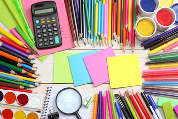 school and office supplies. school background. colored pencils, pen, pains, paper for  school and...