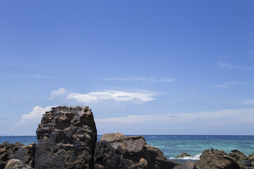 Andaman Sea, emerald sea, blue sky and exotic rocks.