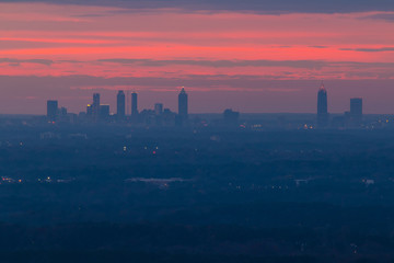 Fototapeta na wymiar The beautiful view of Midtown Atlanta from the Stone Mountain at twilight with red sky, Georgia, USA