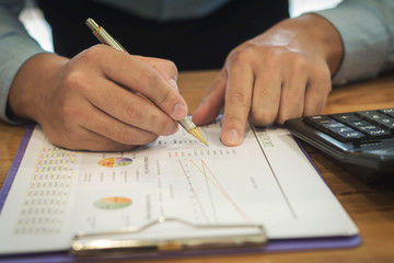 Close up business man signing contract making a deal, classic business
