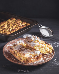 Rustic style pie iced with sugar powder