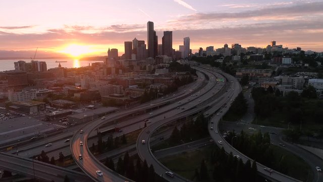 Rising Aerial of Golden Hour Sunset on Downtown Cityscape in Pacific Northwest