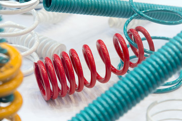 The group of suspension coil spring on the white background.Automotive part