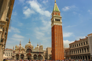 Fototapeta na wymiar Main Venice Piazza San Marco with St. Basil's Cathedral. Mark and bell tower 99 meters high