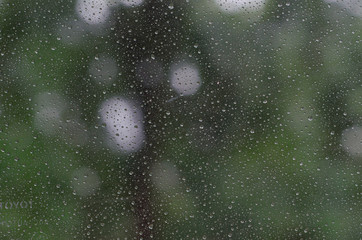 Raindrops on glass background