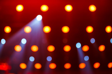 Colorful lights in background of stage