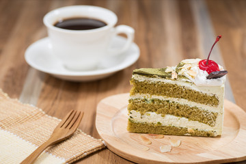 green tea cake with a coffee cup