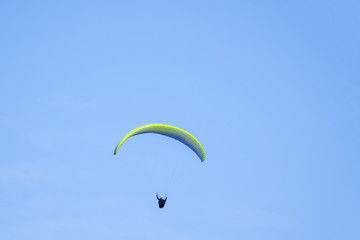 Paragliders flying in the sky
