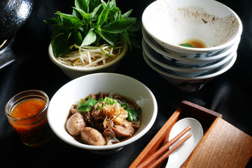 Thai noodle blood soup with pork and pork balls, delicious boat noodle, boat noodle