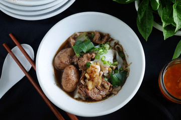 famous Thai noodle blood soup with pork and pork balls, delicious boat noodle, boat noodle
