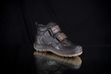 Boot on Black Background,Isolated Product, Top View, Studio.