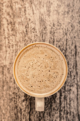 Hot coffee Layout design On a wooden background In warm colors
