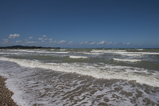 Acharavi Island of Corfu Greece. Waves at the coast. Mediterranean sea