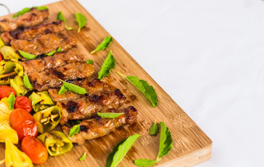 BBQ with ingredient on wood plate