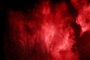 Color powder explosion on black background.