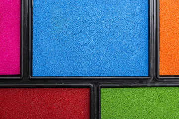 Fototapeta premium Close up shot of different colors of ink boxes