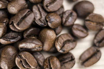 Macro shot of coffee beans on table