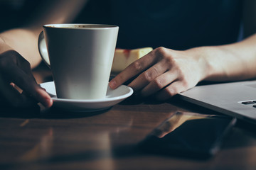 Woman with a mug of coffee, coffee, mug, phone, laptop