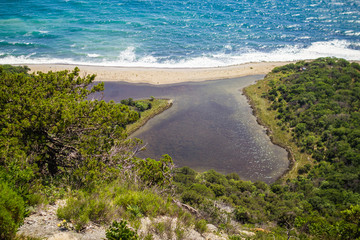 A colorful seashore is like an oasis in the middle of the ocean