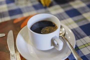 Hotel breakfast is a cup of hot black coffee in Sikkim, India