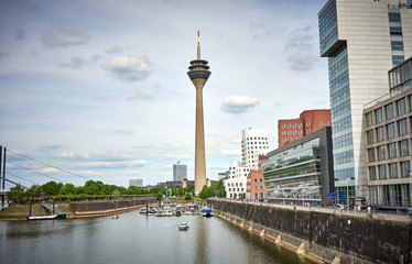 Fototapeta premium Media Harbor at Rhine in Dusseldorf in Germany / Famous place with buildings from Frank Gehry in Dusseldorf