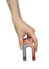 Magnet in a female hand.