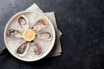 Oysters and lemon over ice