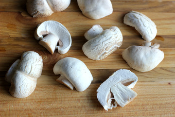 sliced mushrooms on the board