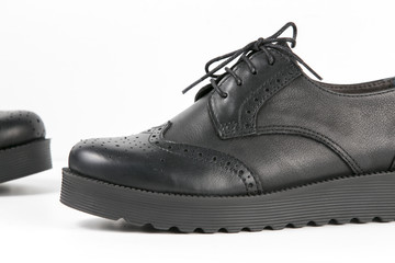 Black Shoe on White Background, Isolated Product, Top View, Studio.