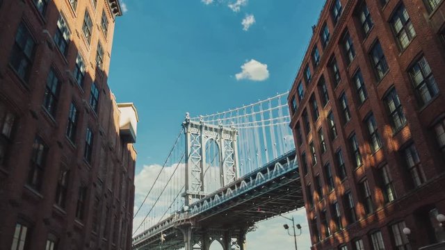 Motion timelapse: The famous Brooklyn Bridge, a popular tourist attraction in New York