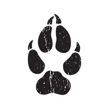 A trace from a wolf. White silhouette of foot on a black background. Vector. The sign of the print of the wolfs legs. Logo of the footprint.
