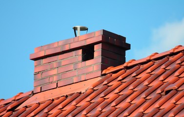 Naklejka premium Roof with chimney, modern ceramic tile