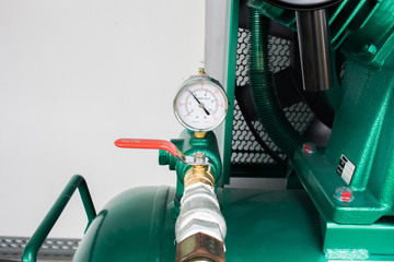 The pressure gauge, in the pneumatic system.