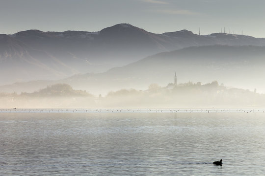 Mistic fog on lake Pusiano from Eupilio, Como and Lecco province, Brianza, Lombardy, Italy, Europe