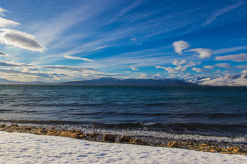 snow beach and mountain near tromso during winter