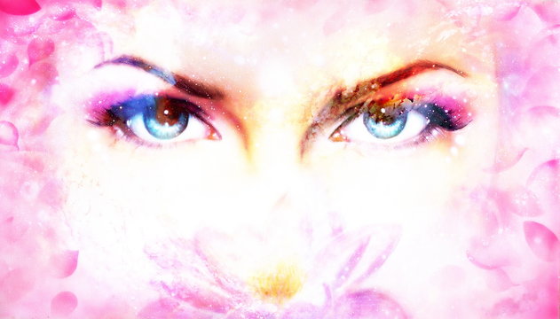 Woman eyes and lotus flower in cosmic background. Eye contact.